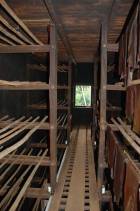 Racks of smoking room for rubber sheets hung on bamboo poles (2007) Racks of smoking room for rubber sheets hung on bamboo poles (2007)